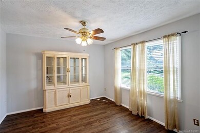 DINING ROOM: The formal dining room is located off