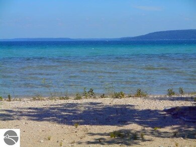 Most of the beach is heavily wooded, but trees and