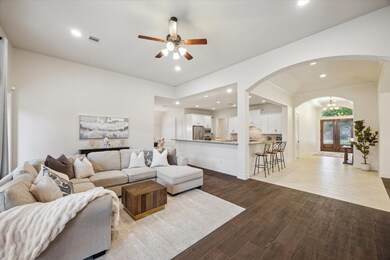 View of the spacious living room with kitchen and