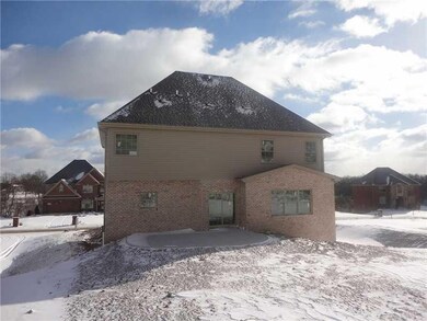 Land/Lot. View of rear yard, house and concrete pa