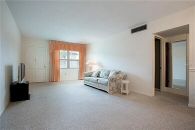 View back towards the front door from the dining a