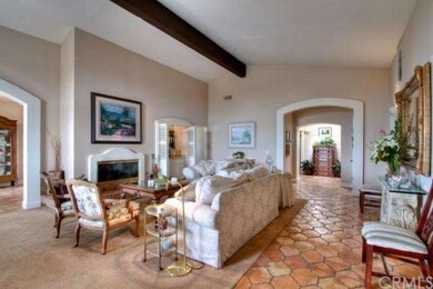 Warm and inviting living room with fireplace and w