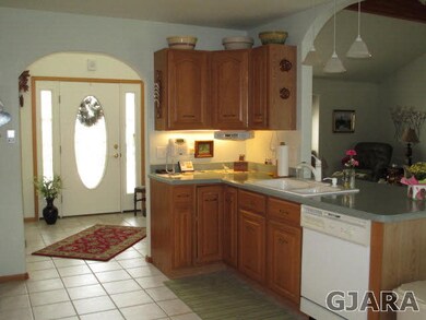 Sink (open viewing to Great Room). Facing front do