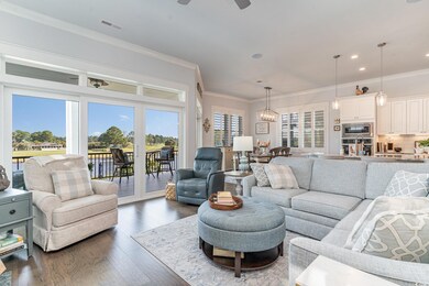 Living room featuring a wealth of natural light, c