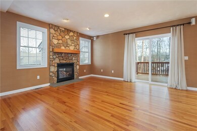 Family room leads to deck which is the length of t