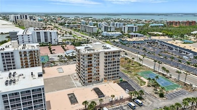View of urban area featuring a pool area and Gulf of America - Virtually Edited Image
