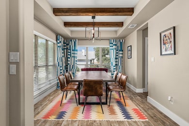 Dining space featuring wood finished floors, heal