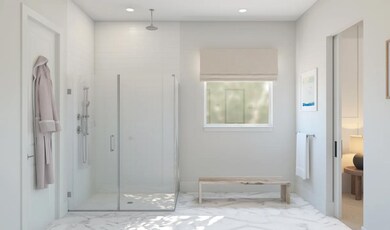 Primary bath with glass shower enclosure