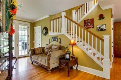 Entrance into living room from covered front porch