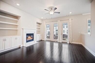 Unfurnished living room with ceiling fan, baseboards, a high end fireplace, dark wood-style floors, and recessed lighting