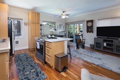 Kitchen featuring a center island, wood-type floor