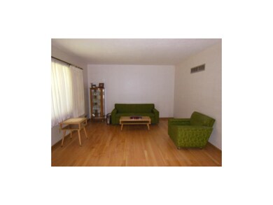 Living room with hardwoods.