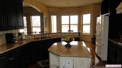Bay window with a view of the course and pond from