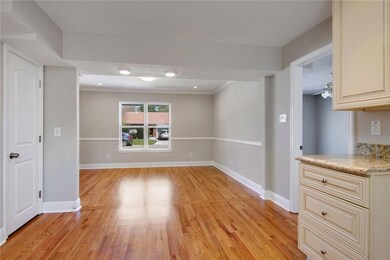 View of Dining room from Kitchen sink. Lovely open