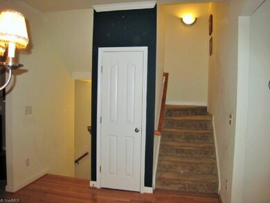 Coat Closet on Main Living Level, 2nd Floor. Staircases go down to Front Door, and up to Master & Second Bedrooms.