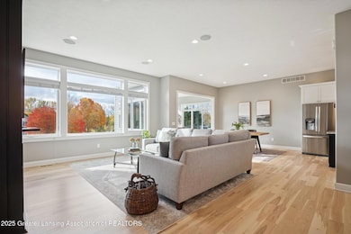 411 Bubbling Springs Ct, Mason, MI 48854 - photo 7