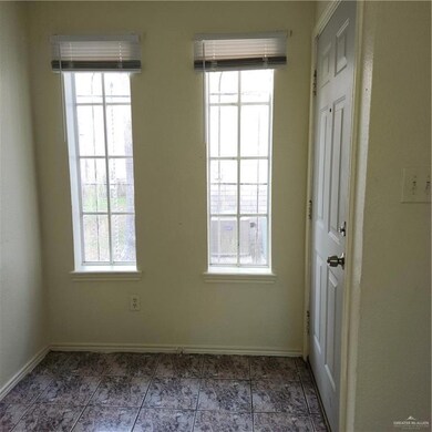 Unfurnished room with baseboards