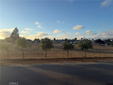 Left of the main gate