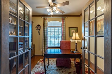 Home office featuring dark wood-type flooring, cei