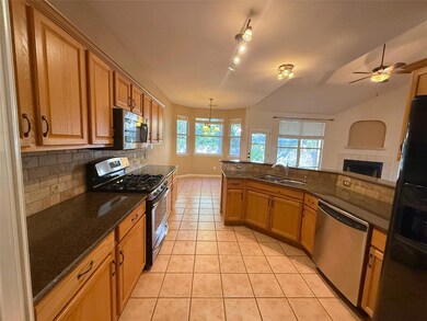 Kitchen has great functional layout and open to the breakfast area and living room.