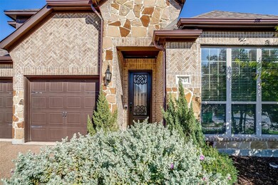 Entrance to property with a garage