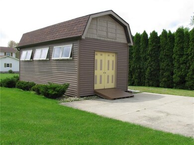 Barn/shed for storage off cement driveway