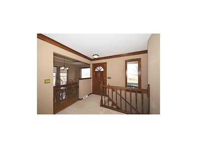 Foyer with Crown Molding and New New Fixtures.
