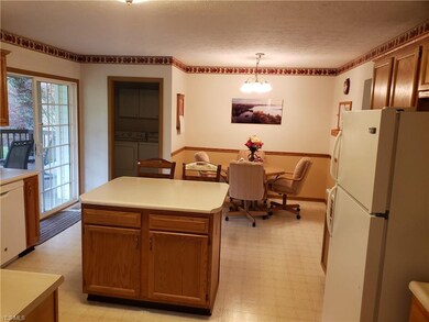 view of island w/ 2 additional eating area, eating