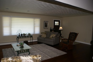 Living room and front door perspective