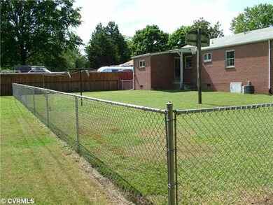 Exterior Back - fenced rear yard has lots of play 