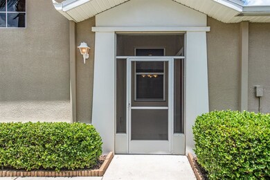 Quite  side entry screened breeze way allow for gr