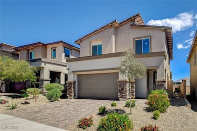 View of front of property with a garage, a gate, s