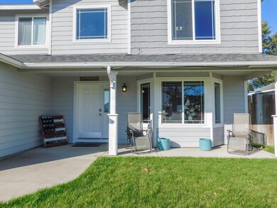 4 - covered patio in front