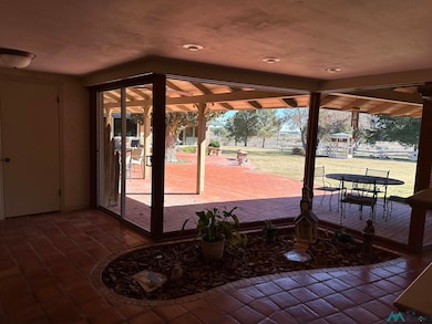 View from front entry way which leads to east and north wing of property.