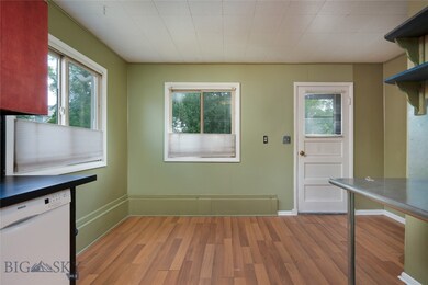 Upstairs kitchen/dining/exterior door to backyard