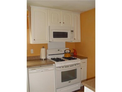 Kitchen. Stove and microwave.