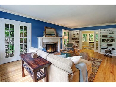 Warm and inviting living room features built-in bo
