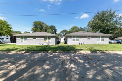 This fourplex offers ample street parking and thou