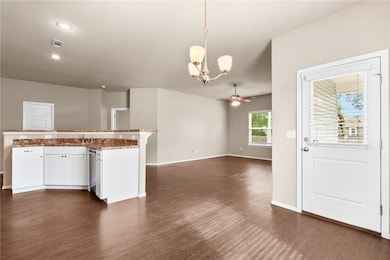 Open-concept layout with defined dining space and