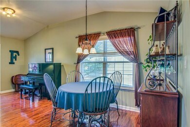 The Dining Room has Updated Lighting and Bright Wi