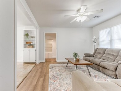 Living room featuring light hardwood / wood-style 