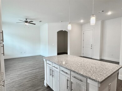 Kitchen island with extra storage and breakfast ba