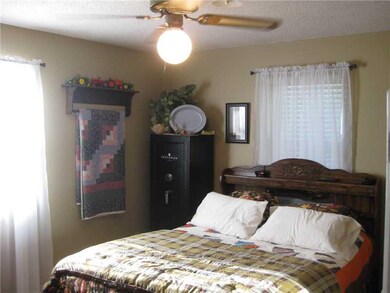 Master Bedroom. Master bedroom has half bath. all ceiling fans and blinds convey.