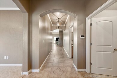 As you open the front door you are greeted with a