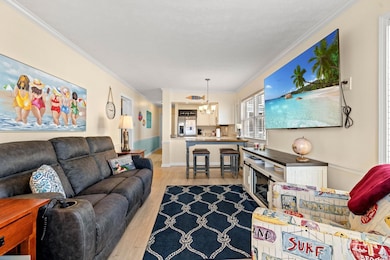 Living Room with Kitchen Bar and Dinette