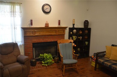Welcome to the family room and rock away by the ga