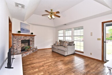 Corner fireplace great for entertaining.