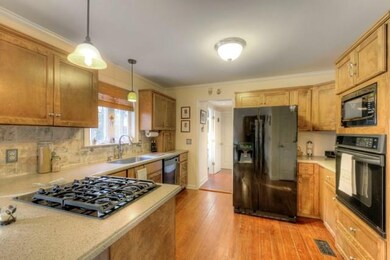 Kitchen with gas range & wall oven