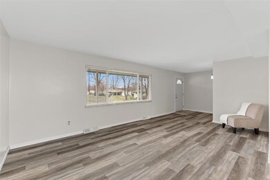 Living Room with Newer Luxury Vinyl Plank Floor an