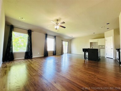 Unfurnished living room with healthy amount of nat